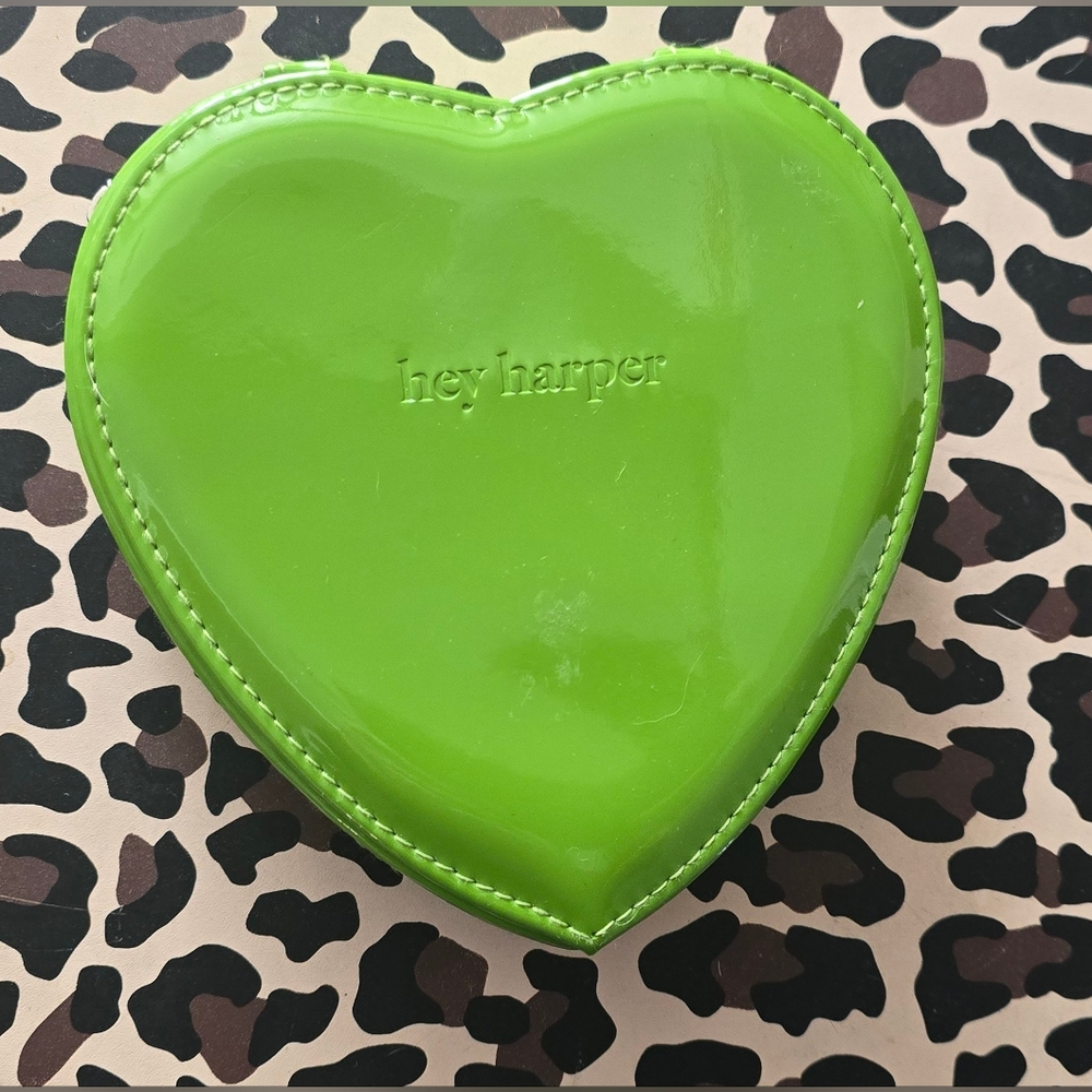 The Hey Harper Heart-Shaped Green Faux Leather Jewelry Box is a linedjewelrycase